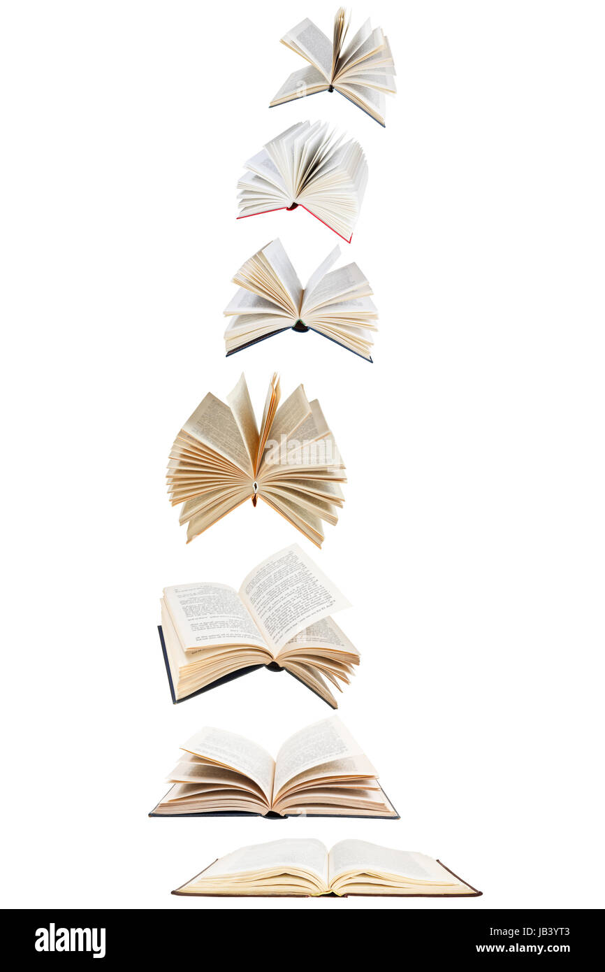 Pila di libri volanti isolati su sfondo bianco Foto stock - Alamy