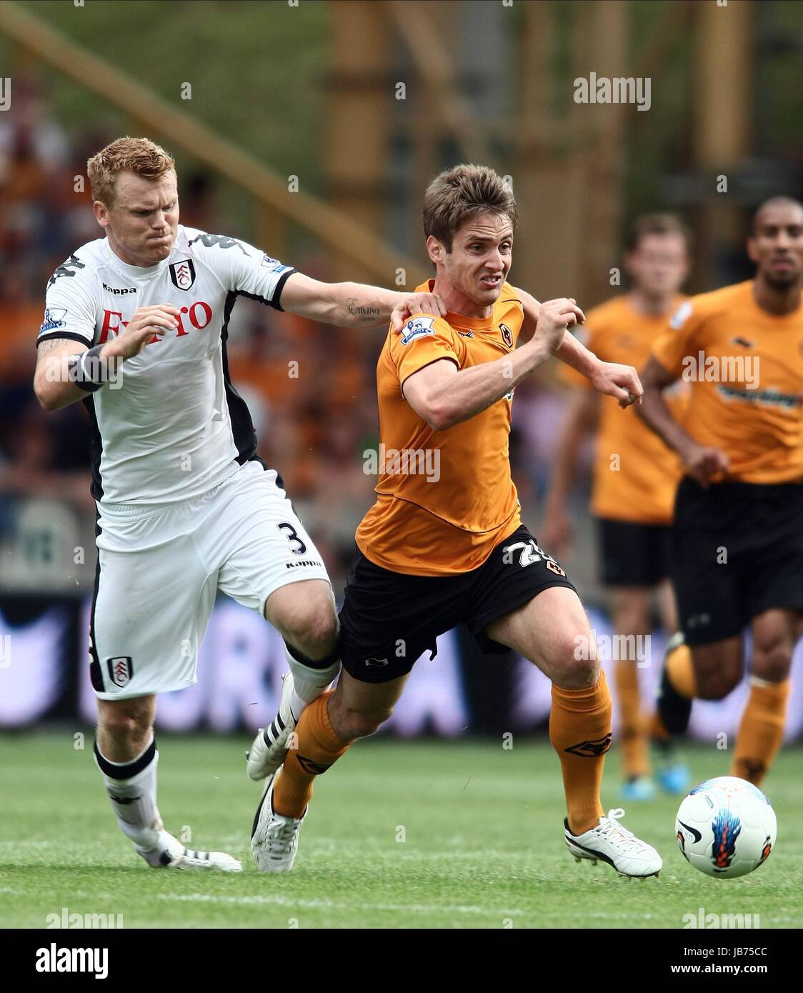 JOHN ARNE RIISE KEVIN DOYLE WOLVERHAMPTON WANDERERS V FULH WOLVERHAMPTON INGHILTERRA 21 Agosto 2011 Foto Stock