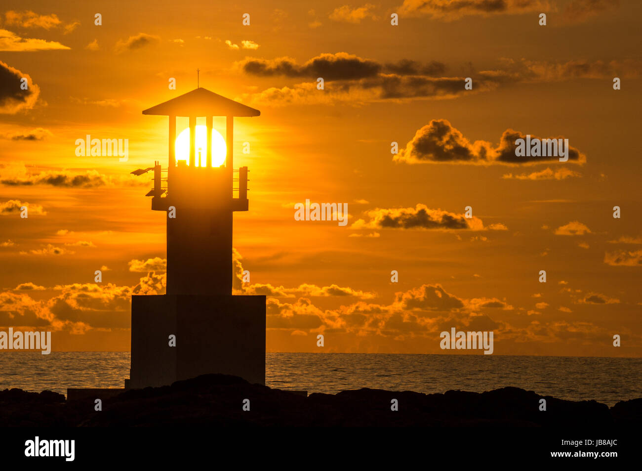 Faro al tramonto Foto Stock