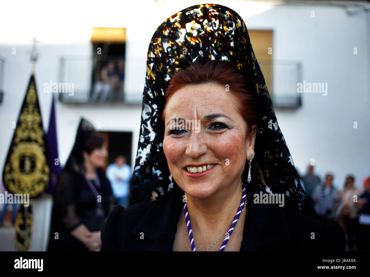 Una donna che indossa un mantilla miglia durante la settimana di Pasqua celebrazioni a Baeza, Provincia di Jaen, Andalusia, Spagna Foto Stock