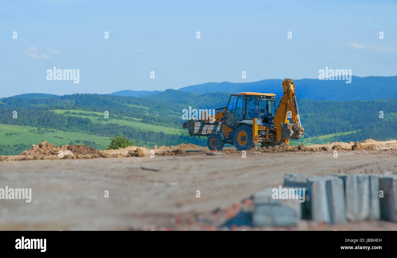 Bulldozer giallo un movimento terra pala Foto Stock