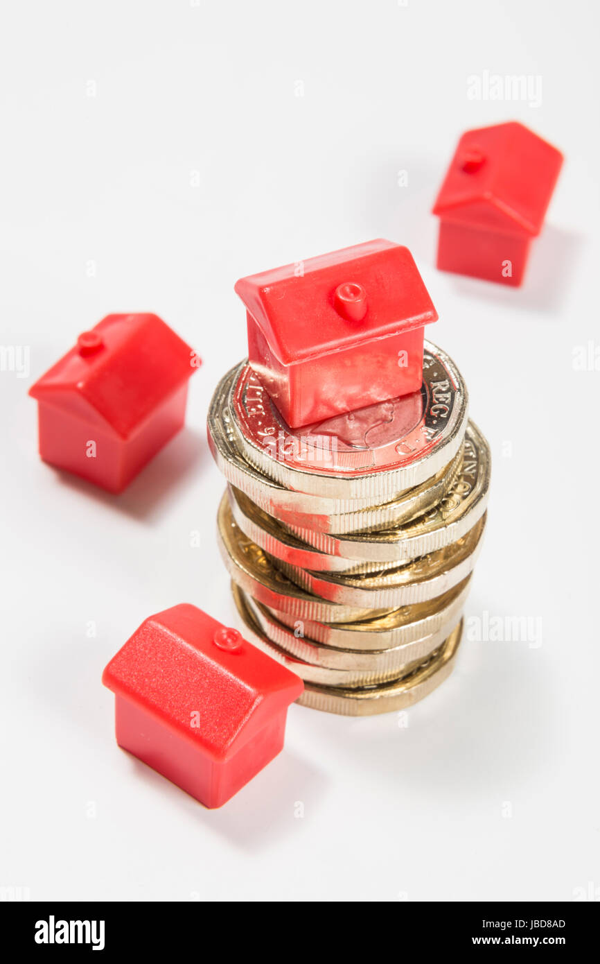 Nuovo REGNO UNITO British Pound monete con case di monopolio & hotels Foto Stock