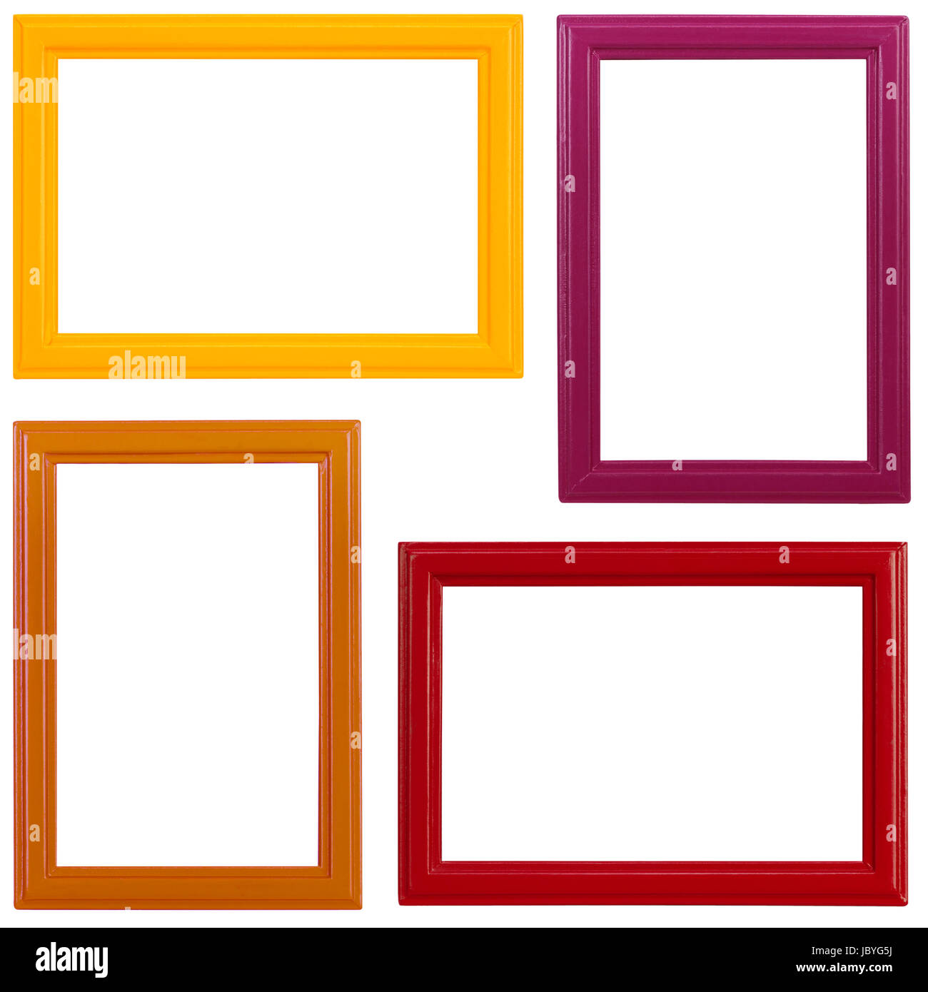 Vier verschiedenfarbige Holzbilderrahmen auf weißem Hintergrund Foto Stock