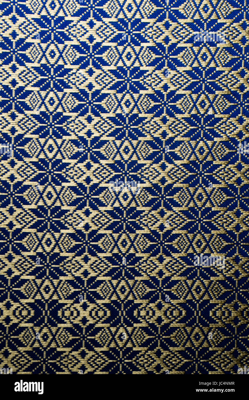 Blu e Oro tailandese tradizionale tessuto texture di sfondo - design  culturale Disegno per tovaglia Foto stock - Alamy