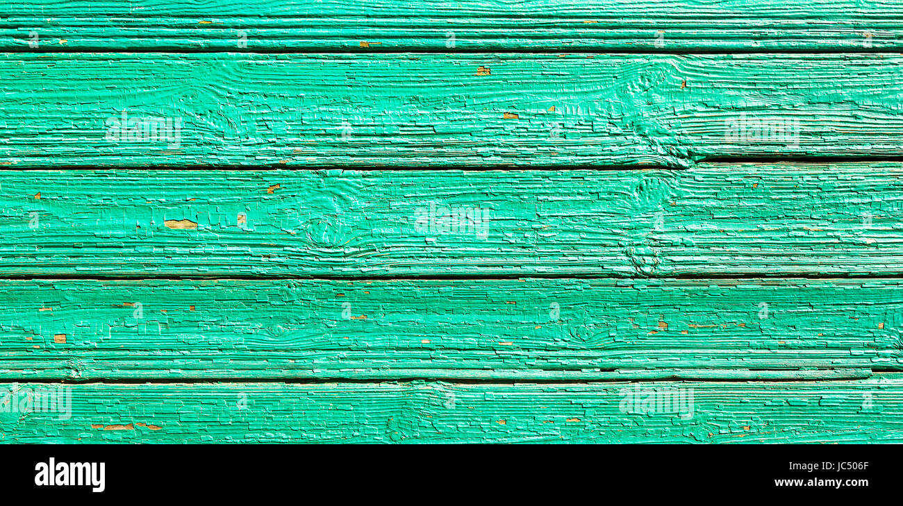 Una parete in legno verniciato in colore verde Foto Stock