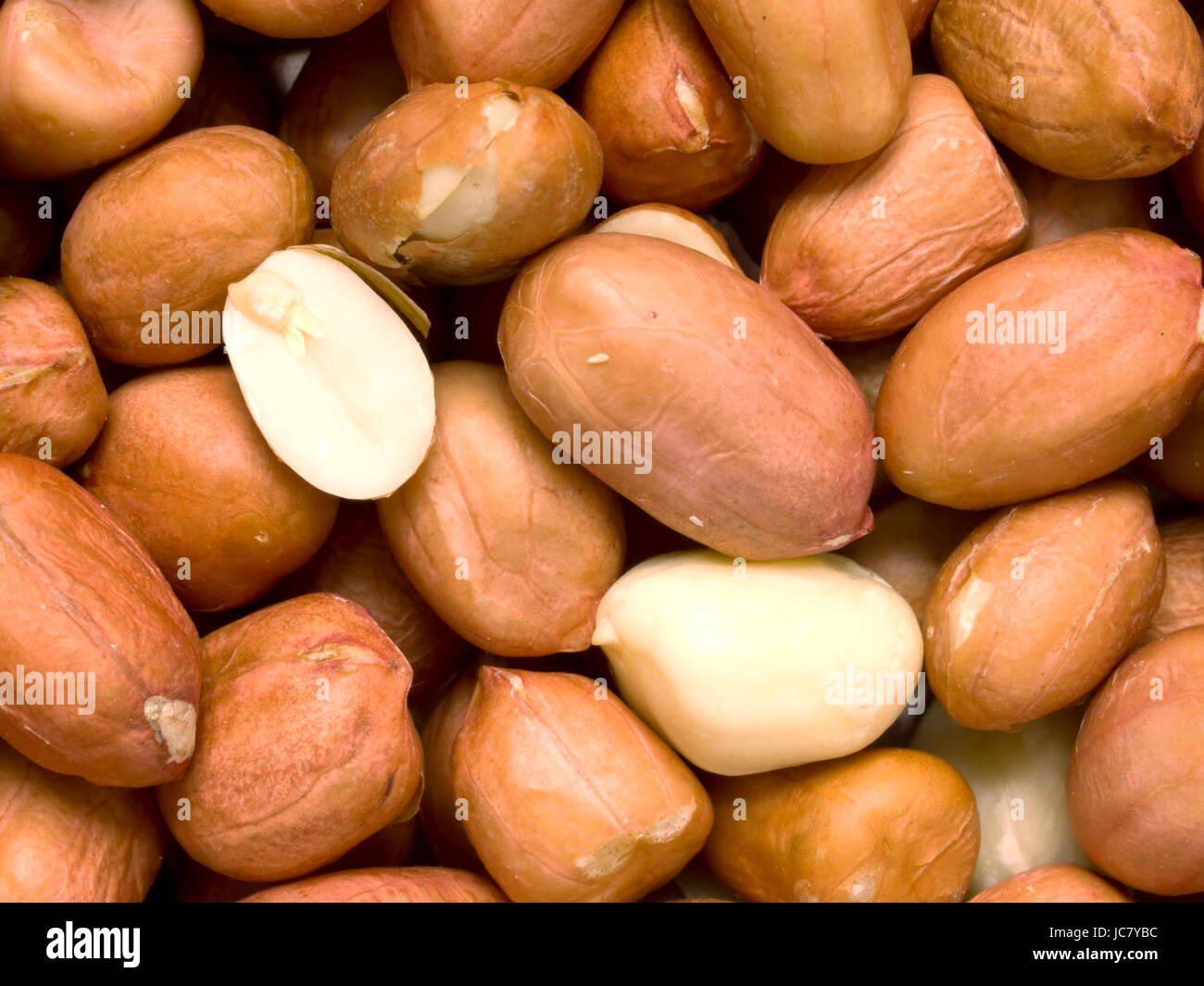 Close up di materie non cotti arachidi sfondo alimentare Foto Stock