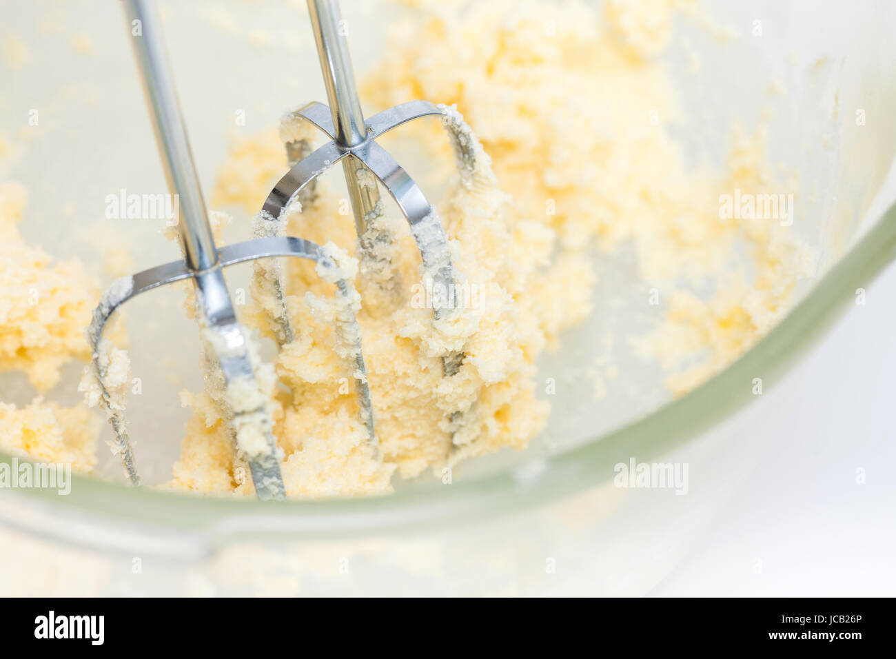 Biscotti al burro preparazione : burro e zucchero misto Foto Stock