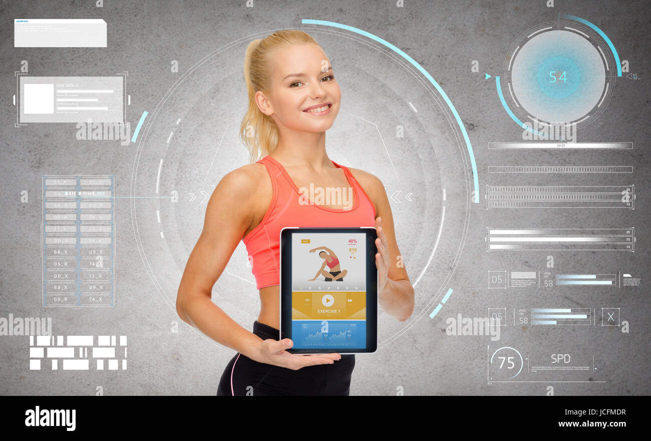 Sportivo da donna con applicazione fitness su tablet pc Foto Stock