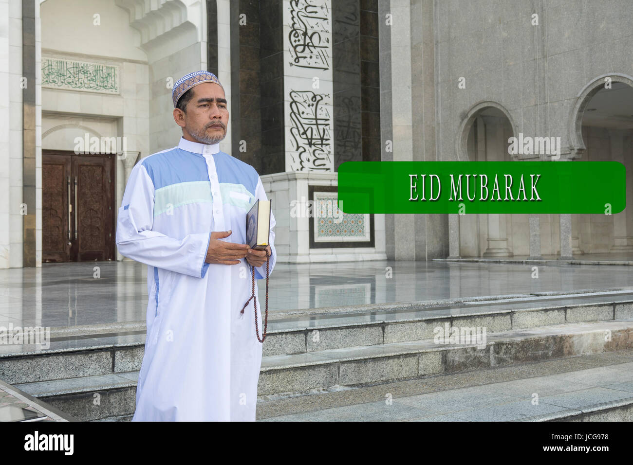EID MUBARAK concetti word con lo sfondo del modello musulmano. Foto Stock
