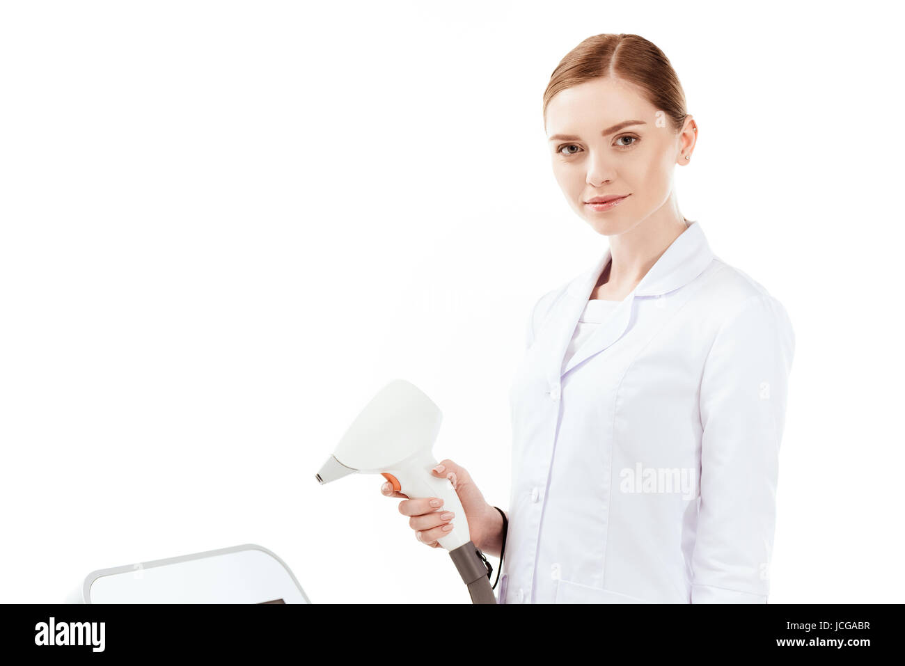 Giovane donna Depilazione laser Apparecchi isolati su bianco. skin care concept Foto Stock