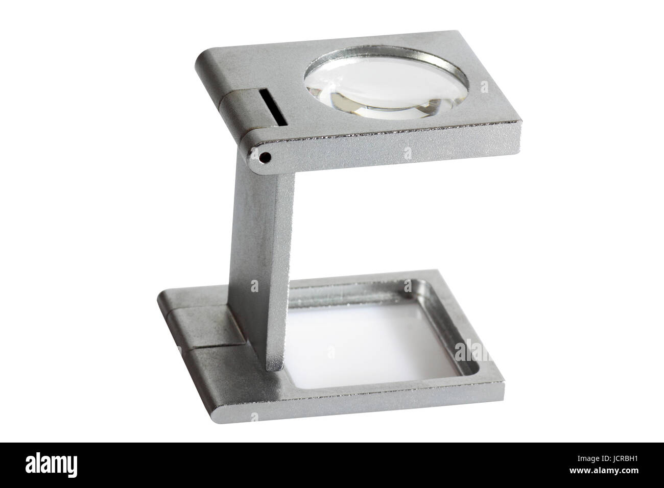 La stampa in offset lente di ingrandimento su sfondo chiaro. Foto Stock