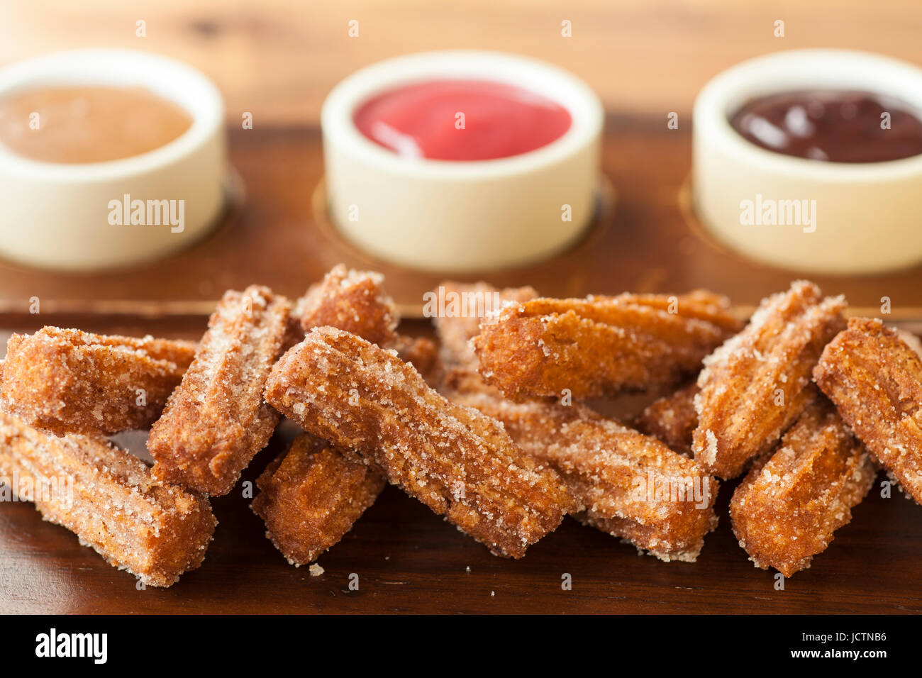 Churos con dulce de leche, lampone e cioccolato salsa di immersione, Loquita Ristorante Santa Barbara, California Foto Stock