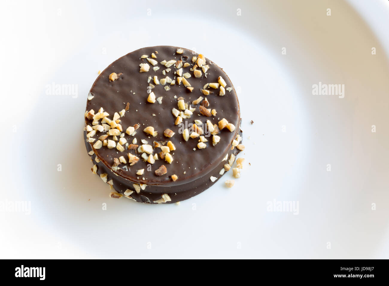 Argentina del cookie "alfajor', cioccolato rivestito cookie sandwich riempito con caramello e mandorla Foto Stock