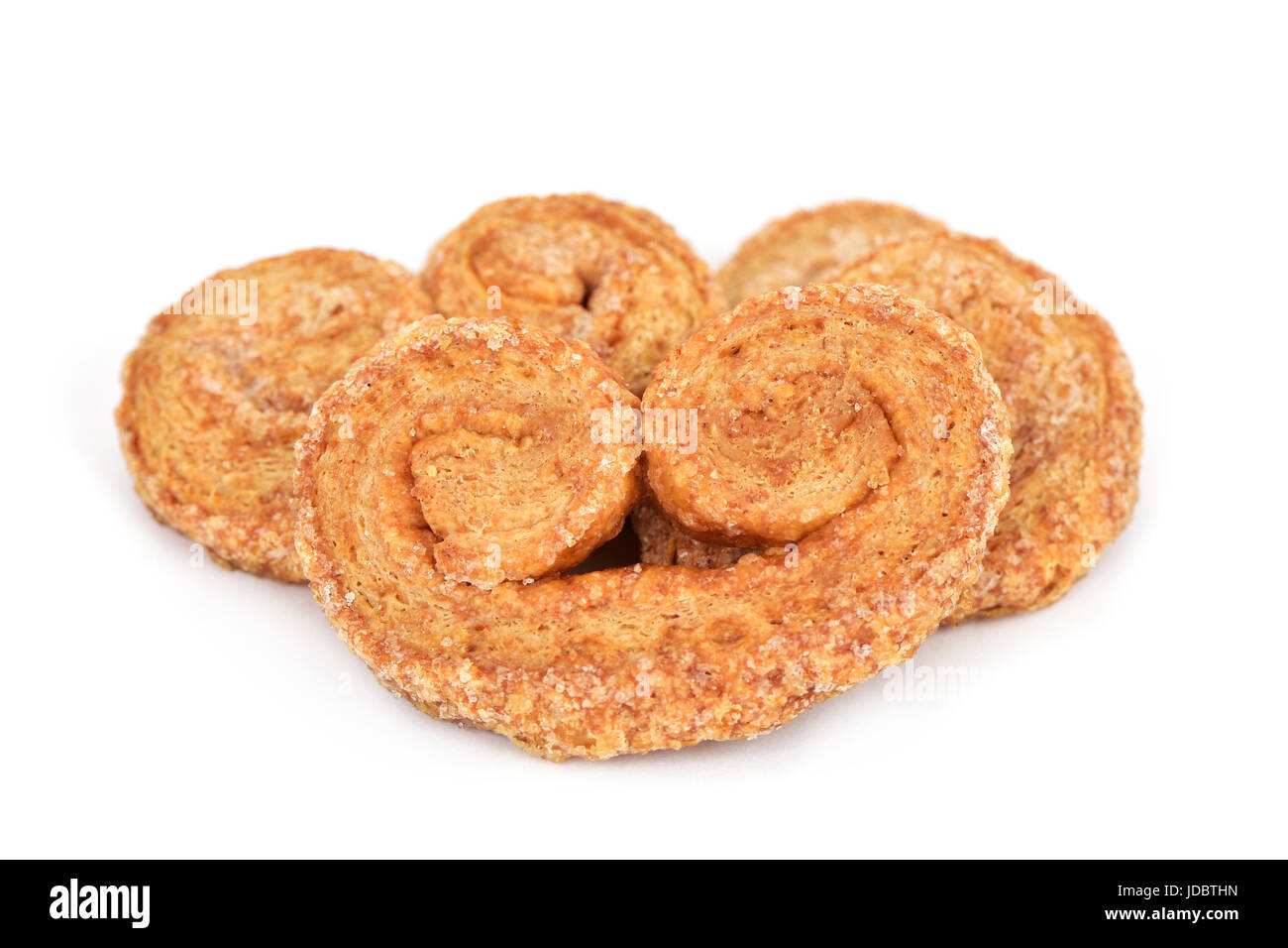 Alcuni palmier pasticceria fatta con farina di farro su sfondo bianco Foto Stock