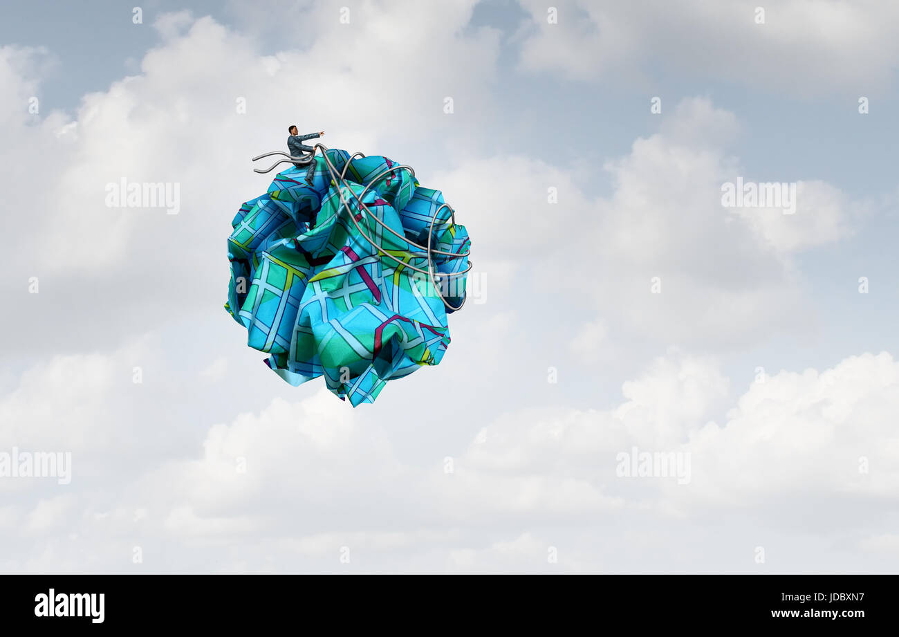 Controllo navigazione nozione come un imprenditore accartocciata in direzione strada carta come una metafora di leadership per prendere le redini per raggiungere un successo. Foto Stock