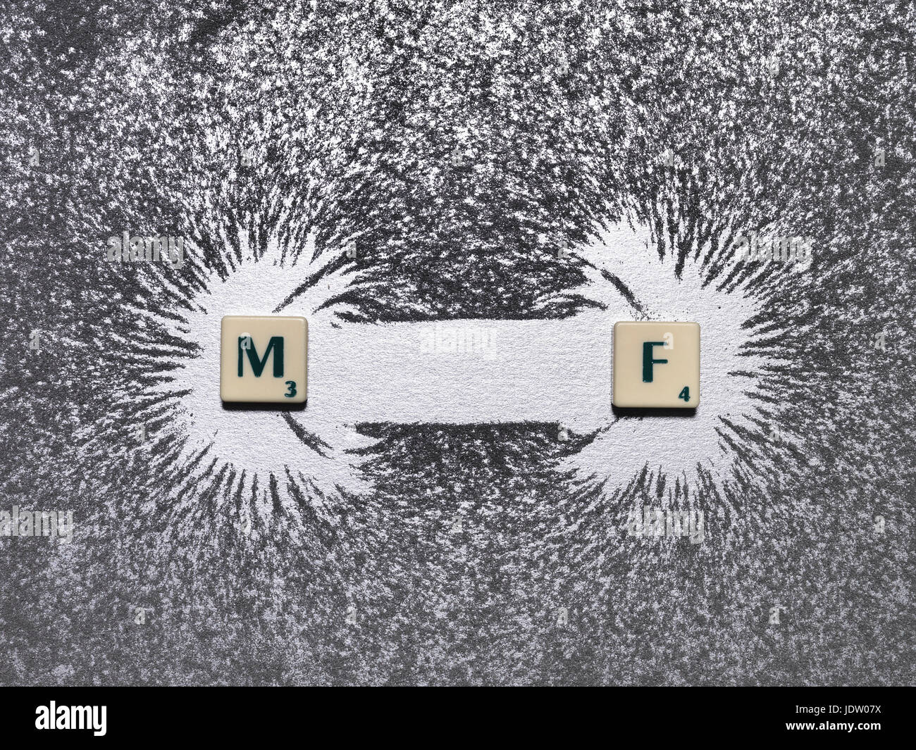 Letterati di piastrelle con la limatura di ferro Foto Stock