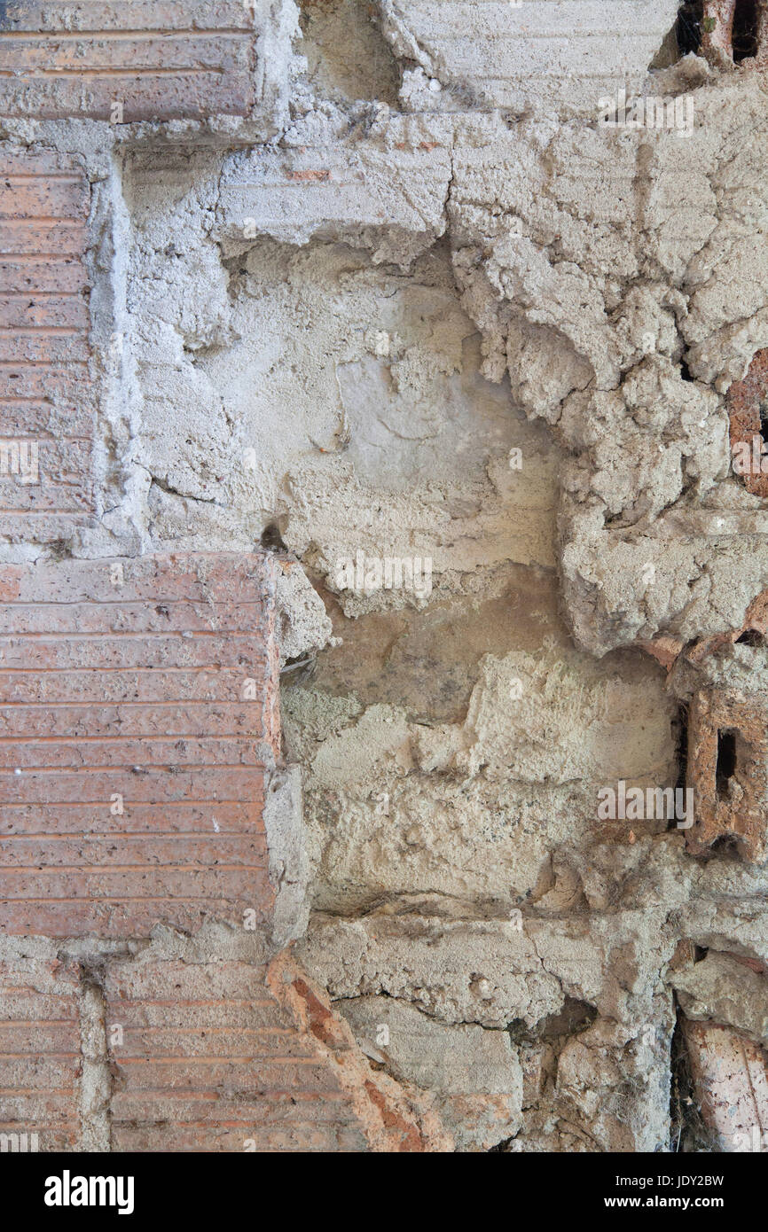 Abstract rosso e lo sfondo bianco di mattoni e cemento testura sabbiosa. Foto Stock