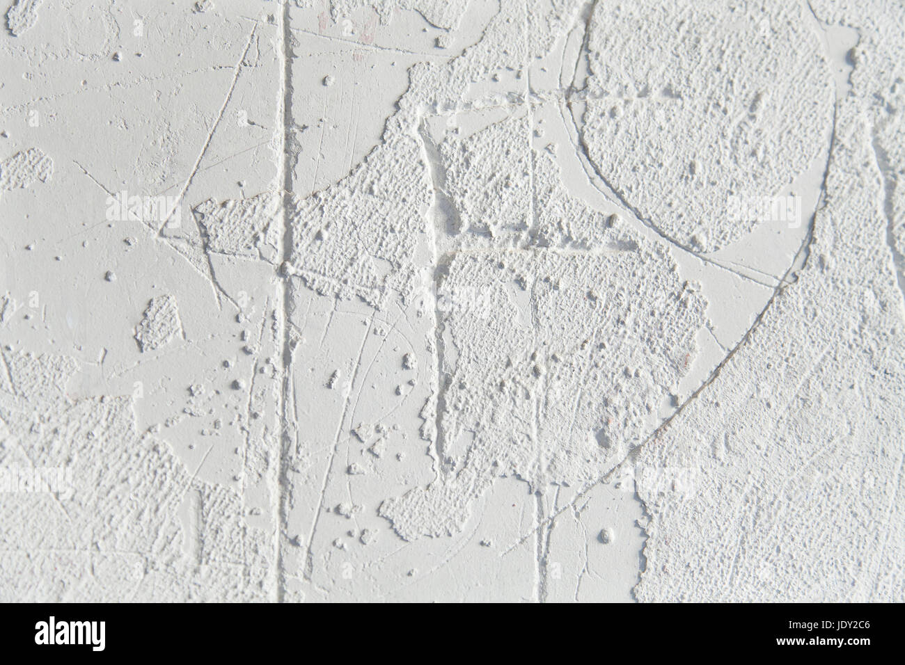 Abstract in gesso bianco sullo sfondo testura sabbiosa. Foto Stock