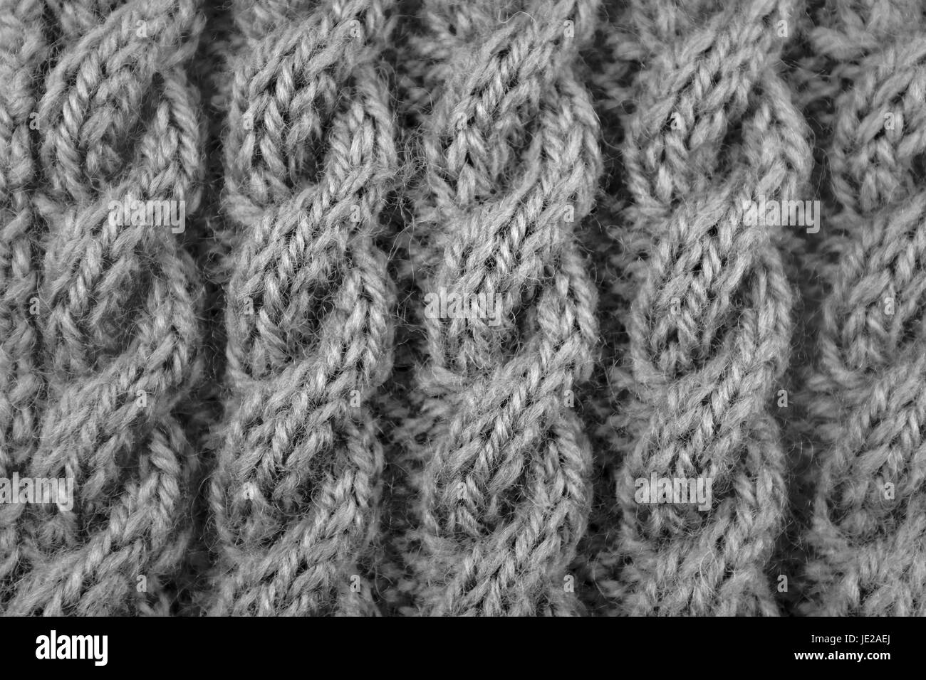 Chiudere fino a spirale cavo corda maglia stitch - elaborazione monocromatica Foto Stock