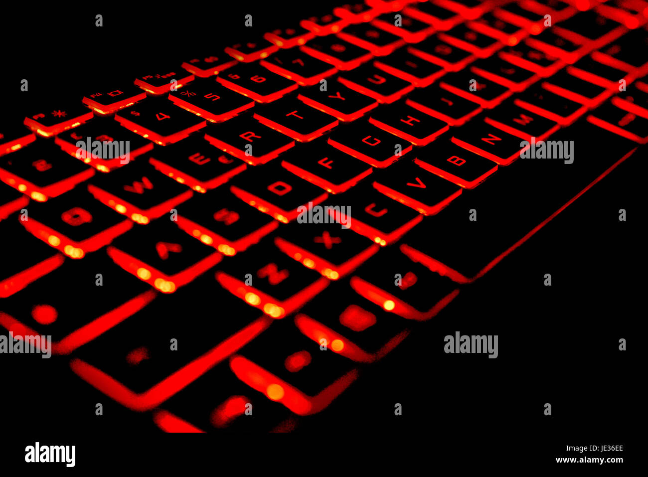 Tastiera di colore rosso su sfondo nero Foto Stock