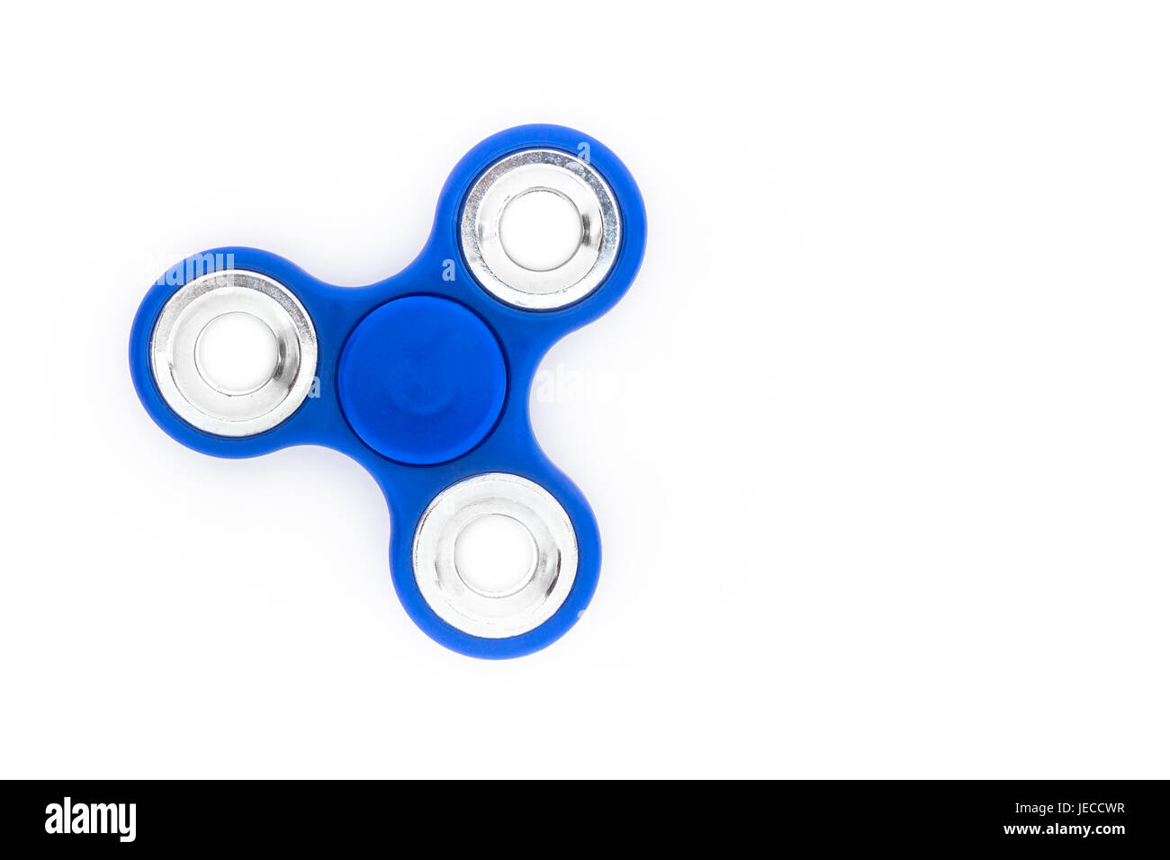 Dito blu spinner (stress ansia giocattolo di sfiato) isolato su sfondo bianco. Vista aerea. Foto Stock