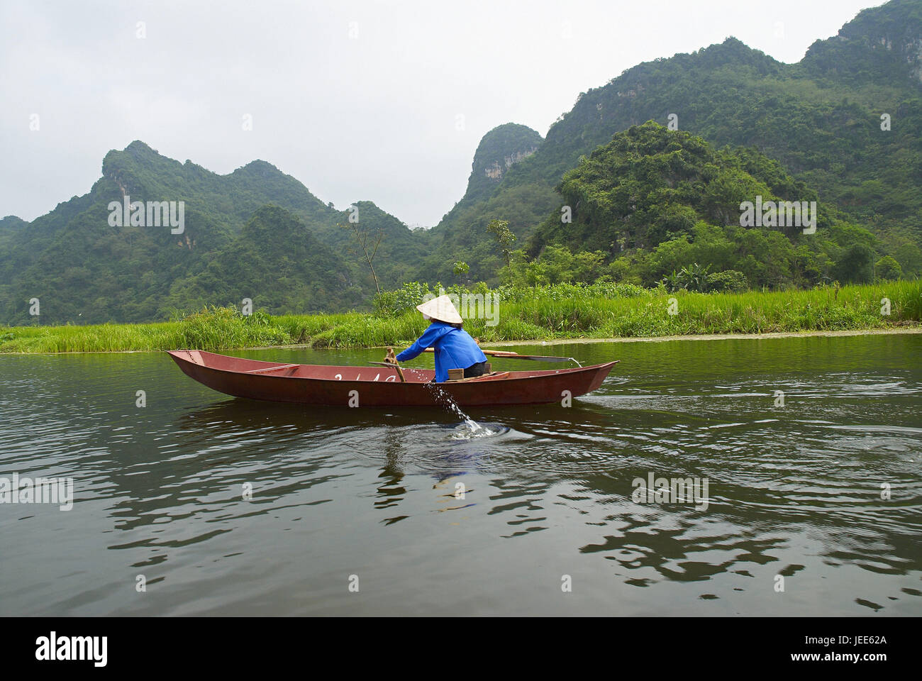 Asia, Vietnam, donna su un boot, Foto Stock