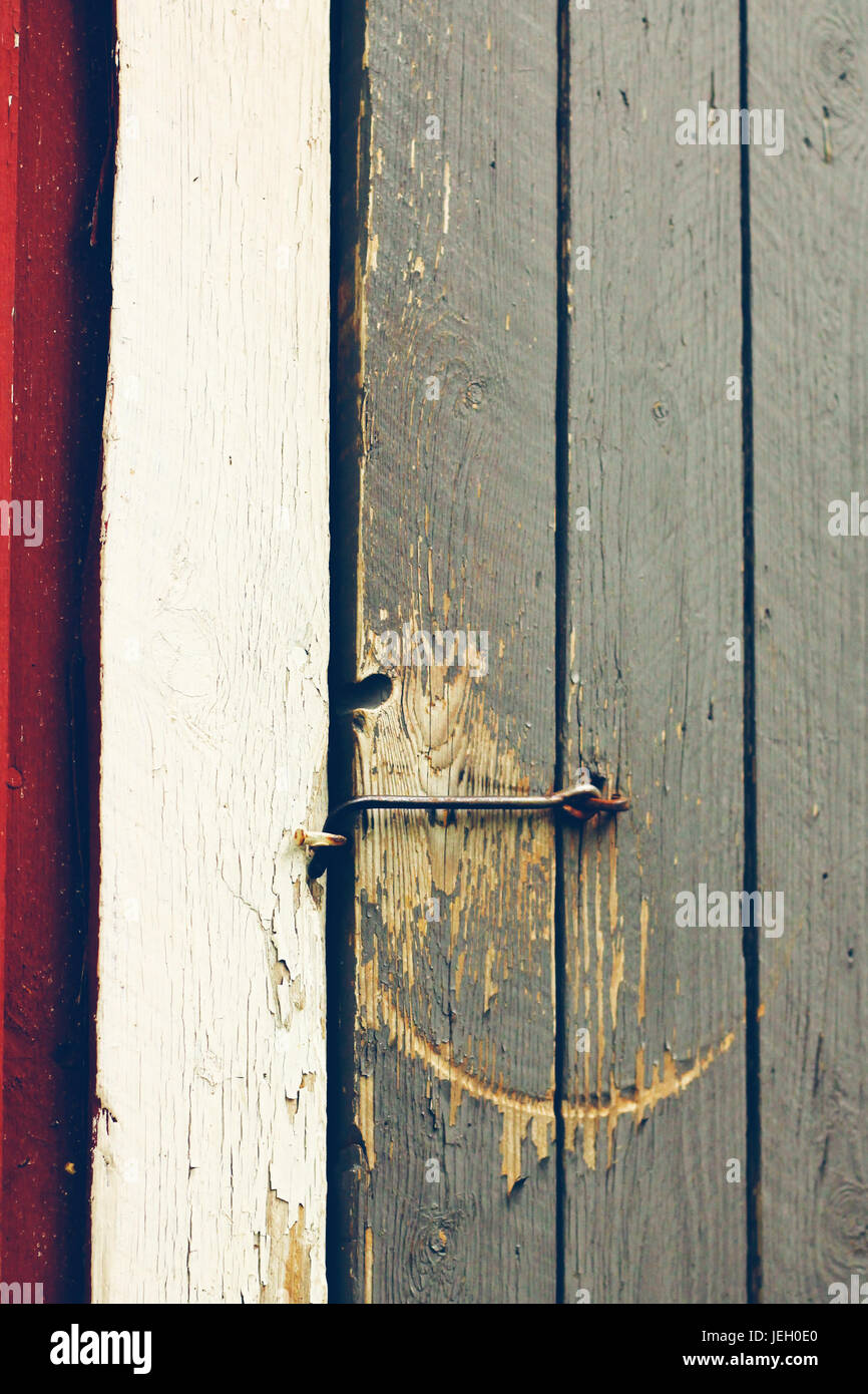 Il vecchio fienile in legno porta Foto Stock