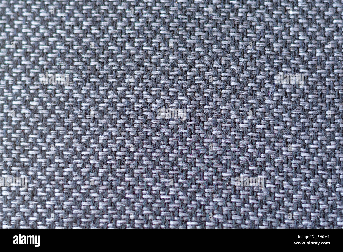 Accendisigari scuro e grigio fibre di tessuto da vicino da sopra Foto Stock