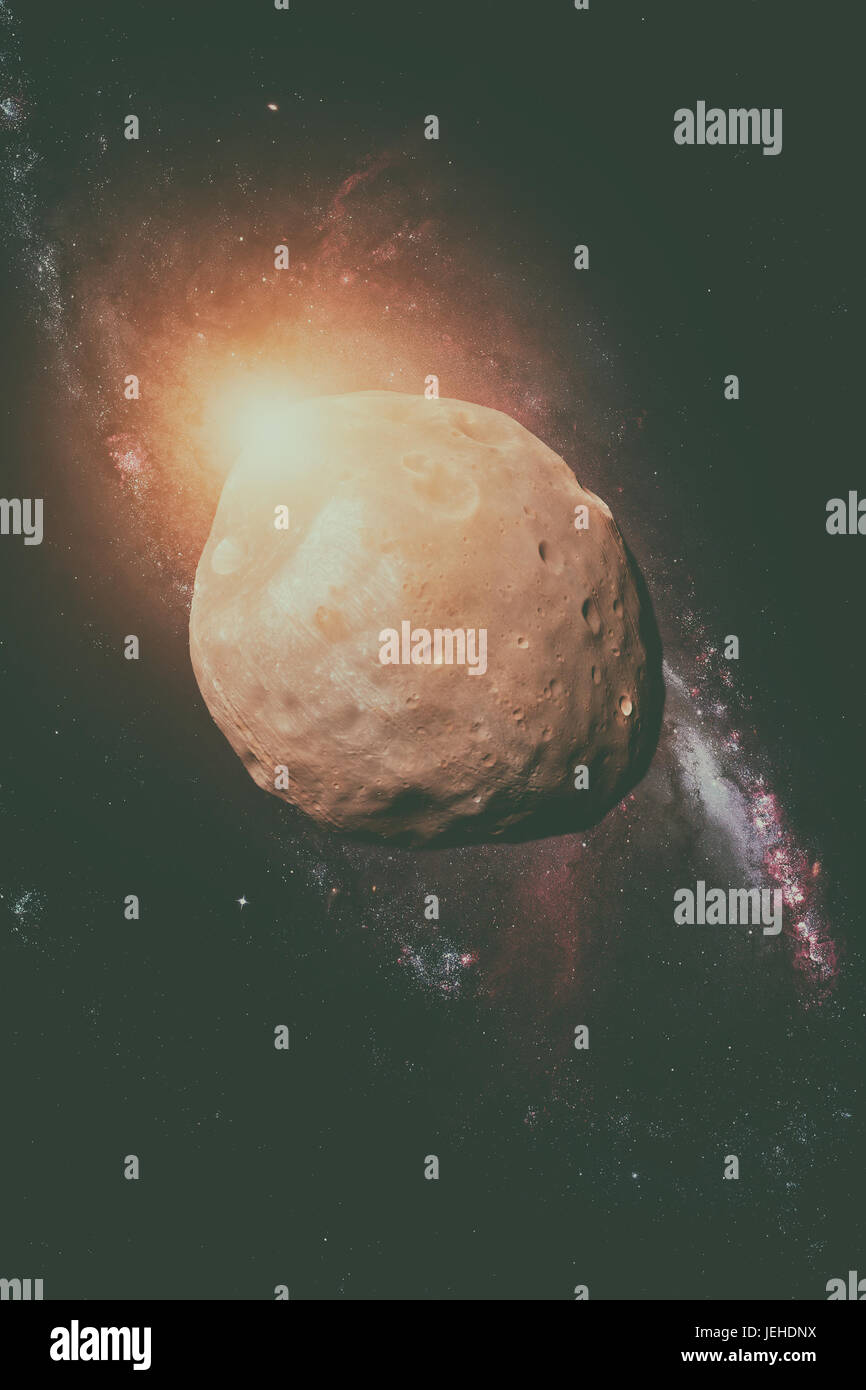 Phobos è il più grande e il più interno dei due satelliti naturali di Marte, l'altro essendo Deimos. Ritoccato immagine. Gli elementi di questa immagine fornita dal NAS Foto Stock