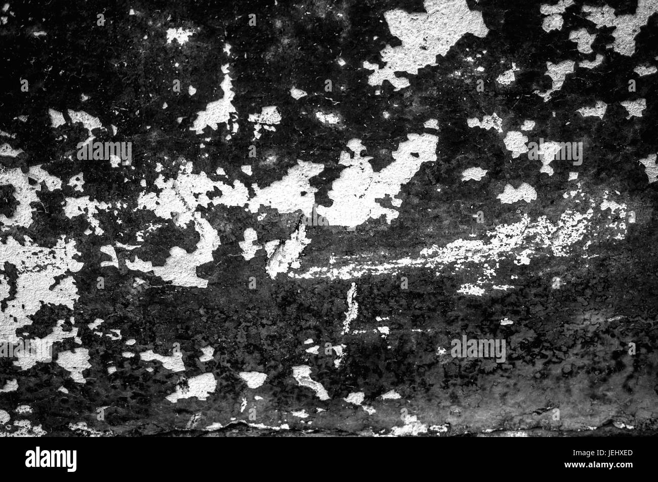 Sfondo astratto naturale intonaco sulla parete plain textured grigio scuro con macchie nere . Foto Stock