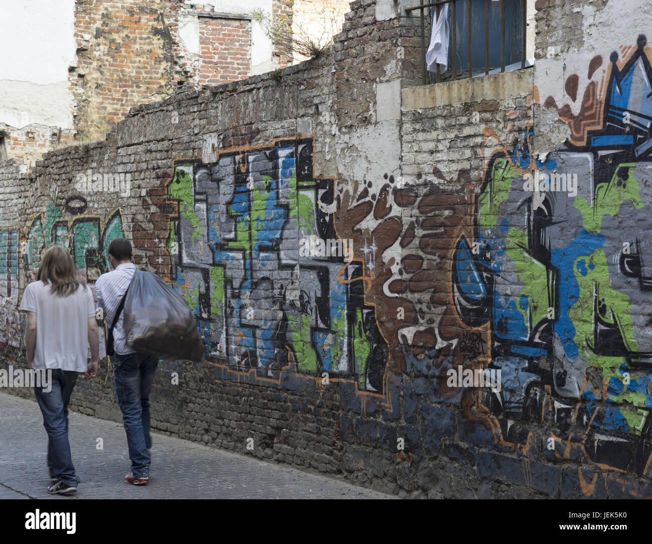 Alte Mauer mit Graffity Foto Stock