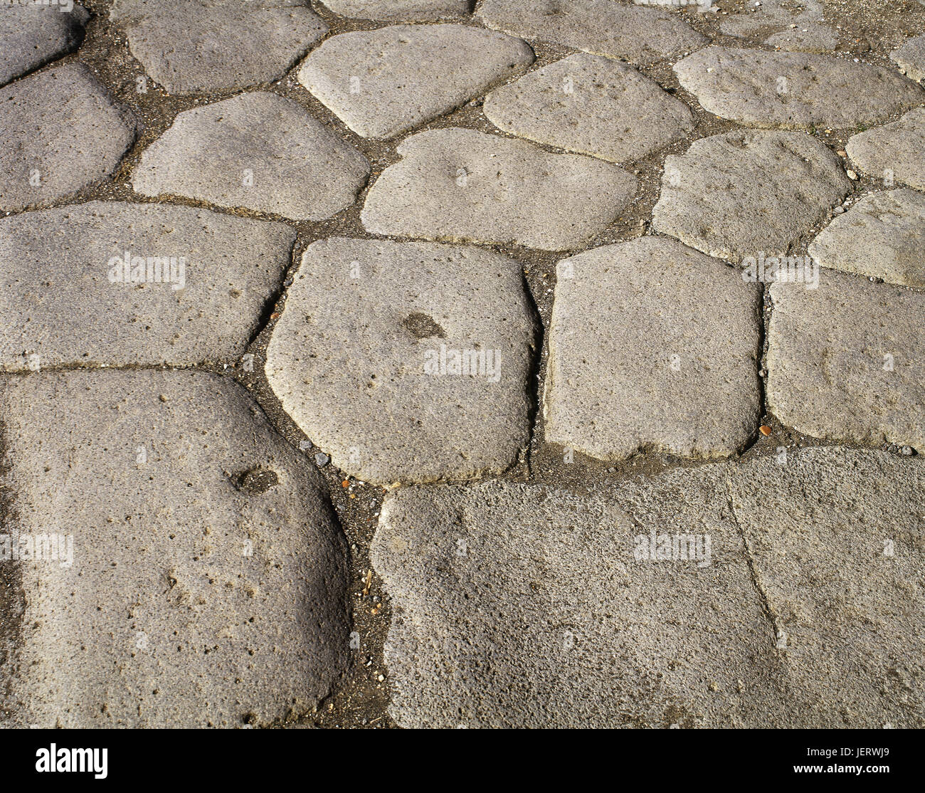 L'Italia. Pompei. Via Consolare. Pavimentazione in pietra. Dettaglio. Campania. Foto Stock