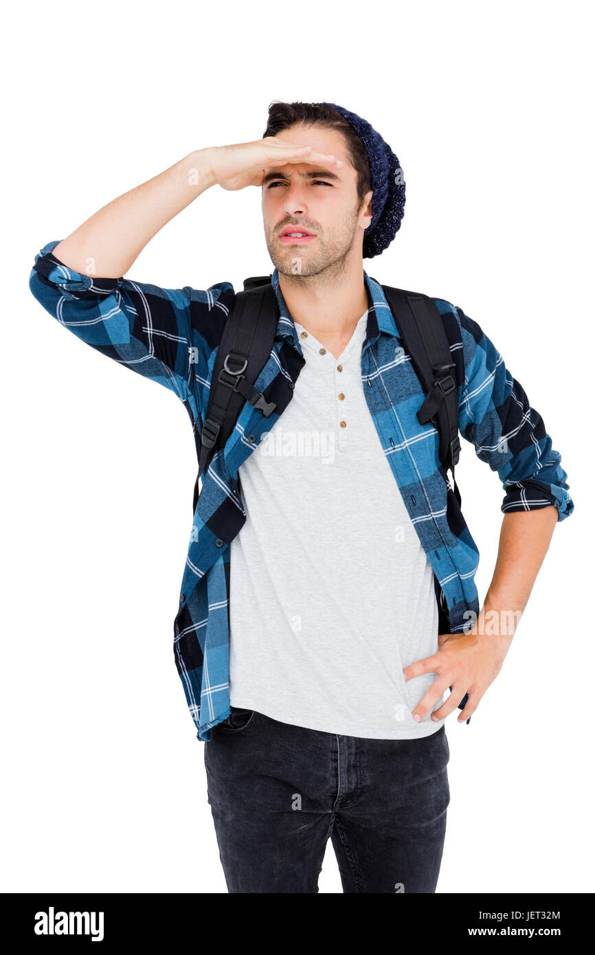 Giovane uomo agli occhi di schermatura Foto Stock