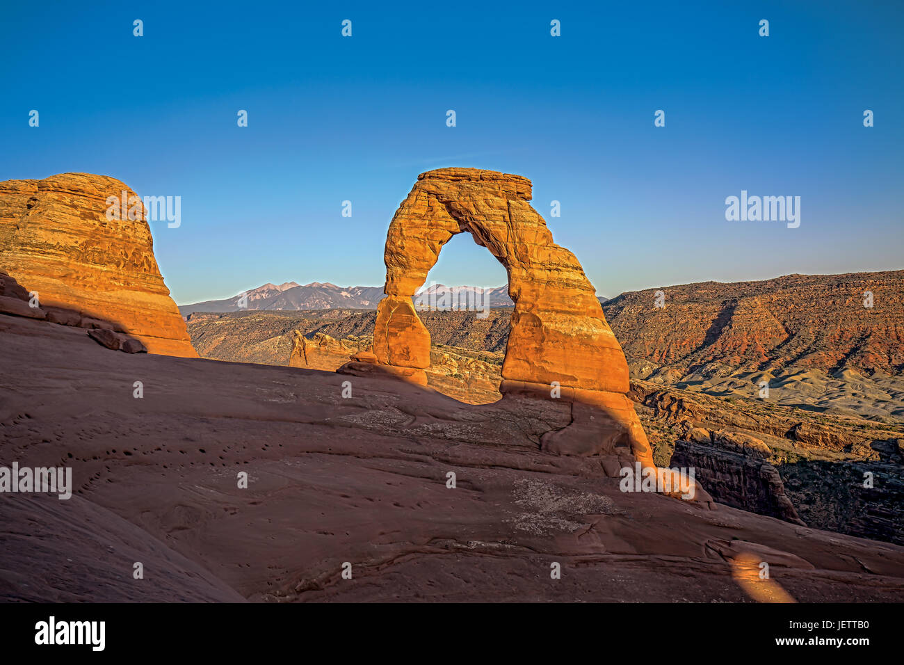 Delicate Arch al tramonto in Arches National Park nello Utah Foto Stock