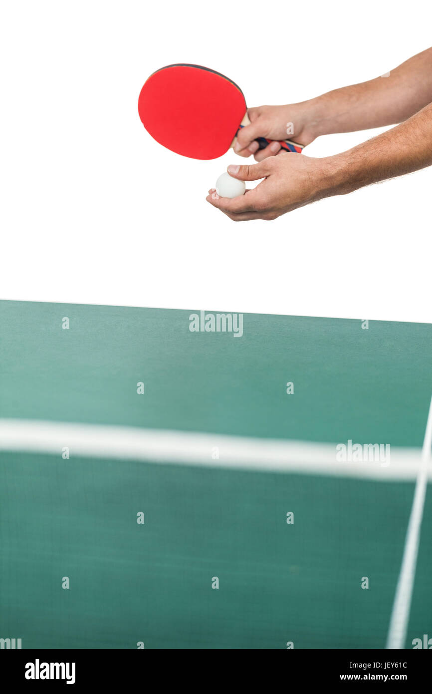 Atleta maschio giocando a ping-pong Foto Stock