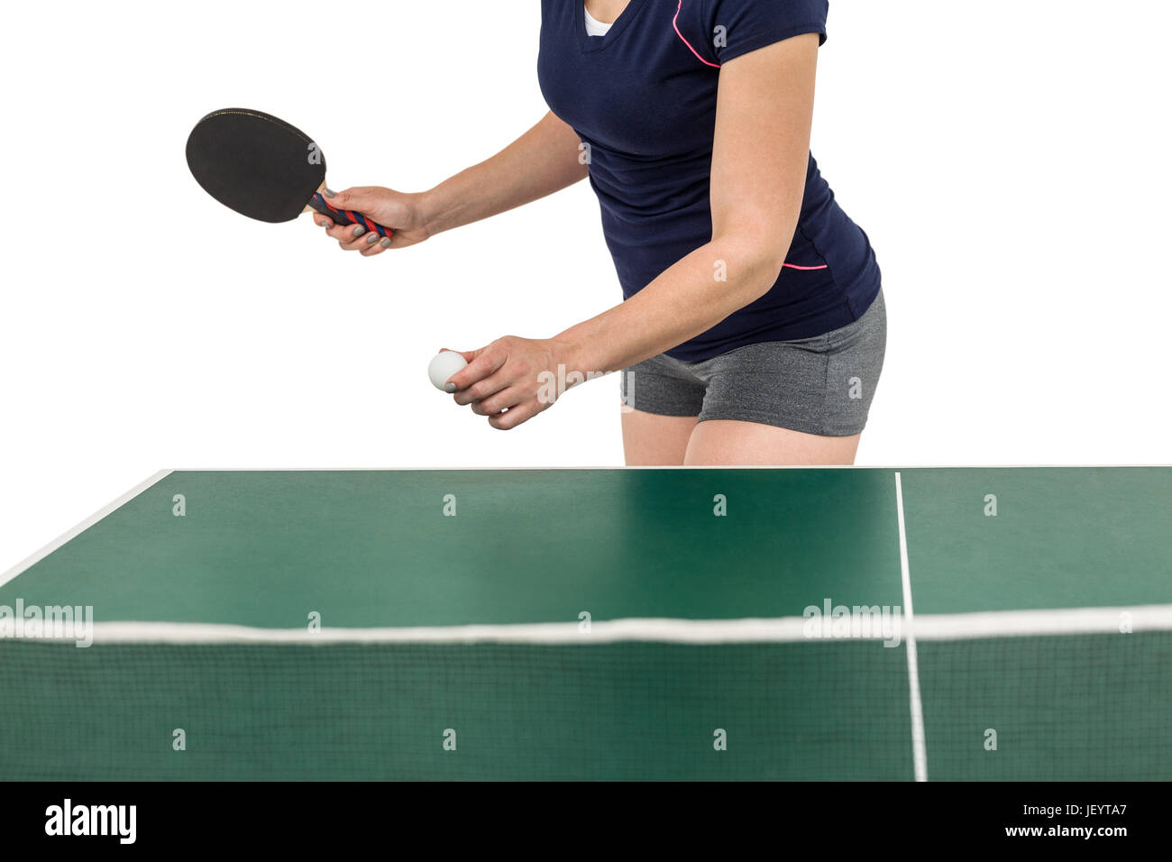 Atleta femminile giocando a ping-pong Foto Stock