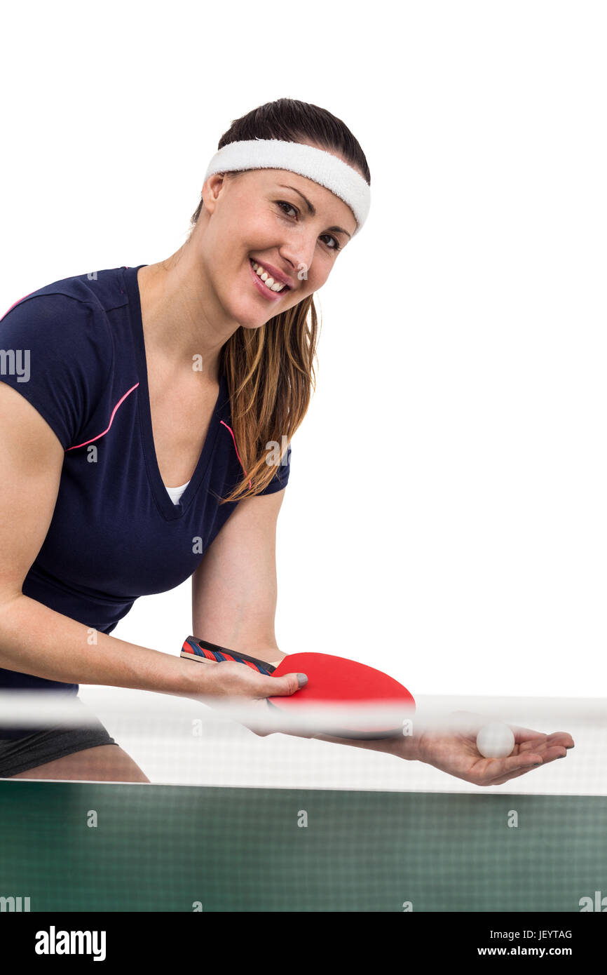 Atleta femminile giocando a ping-pong Foto Stock