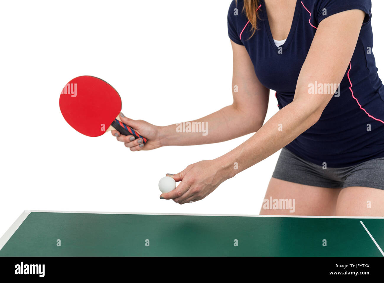 Atleta femminile giocando a ping-pong Foto Stock