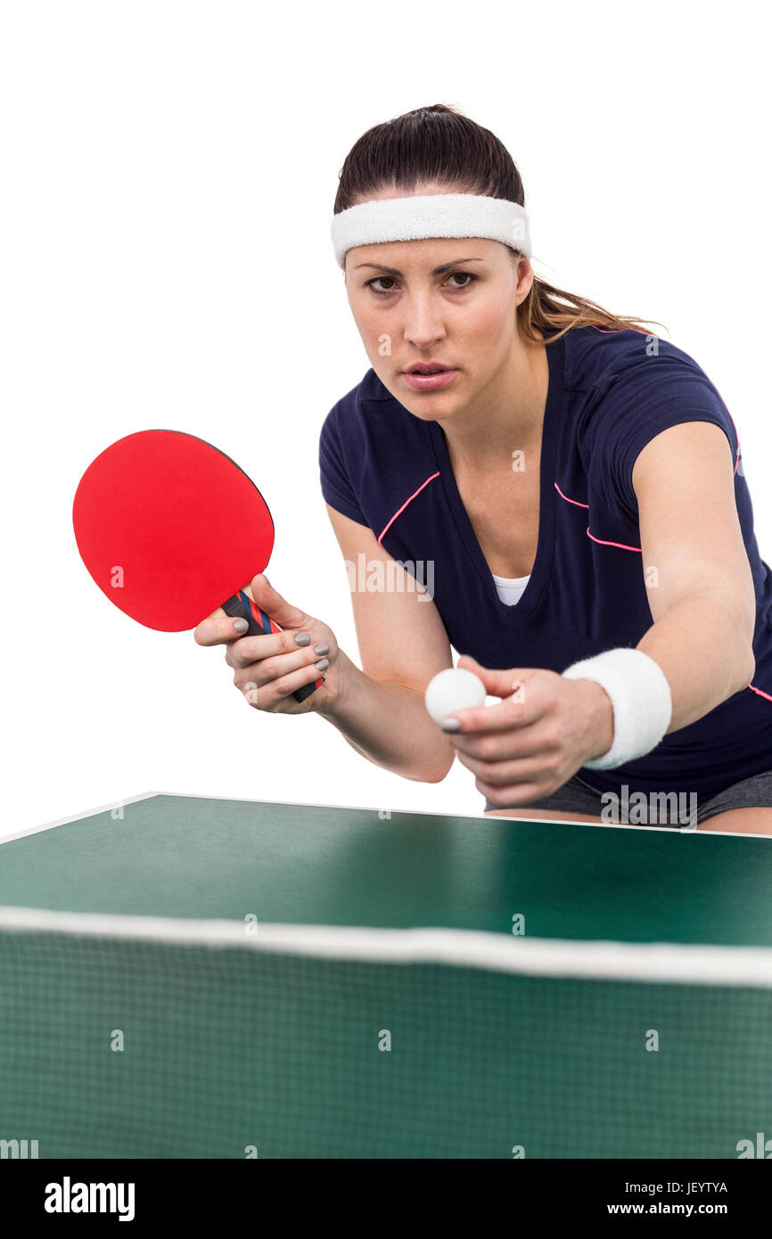 Atleta femminile giocando a ping-pong Foto Stock