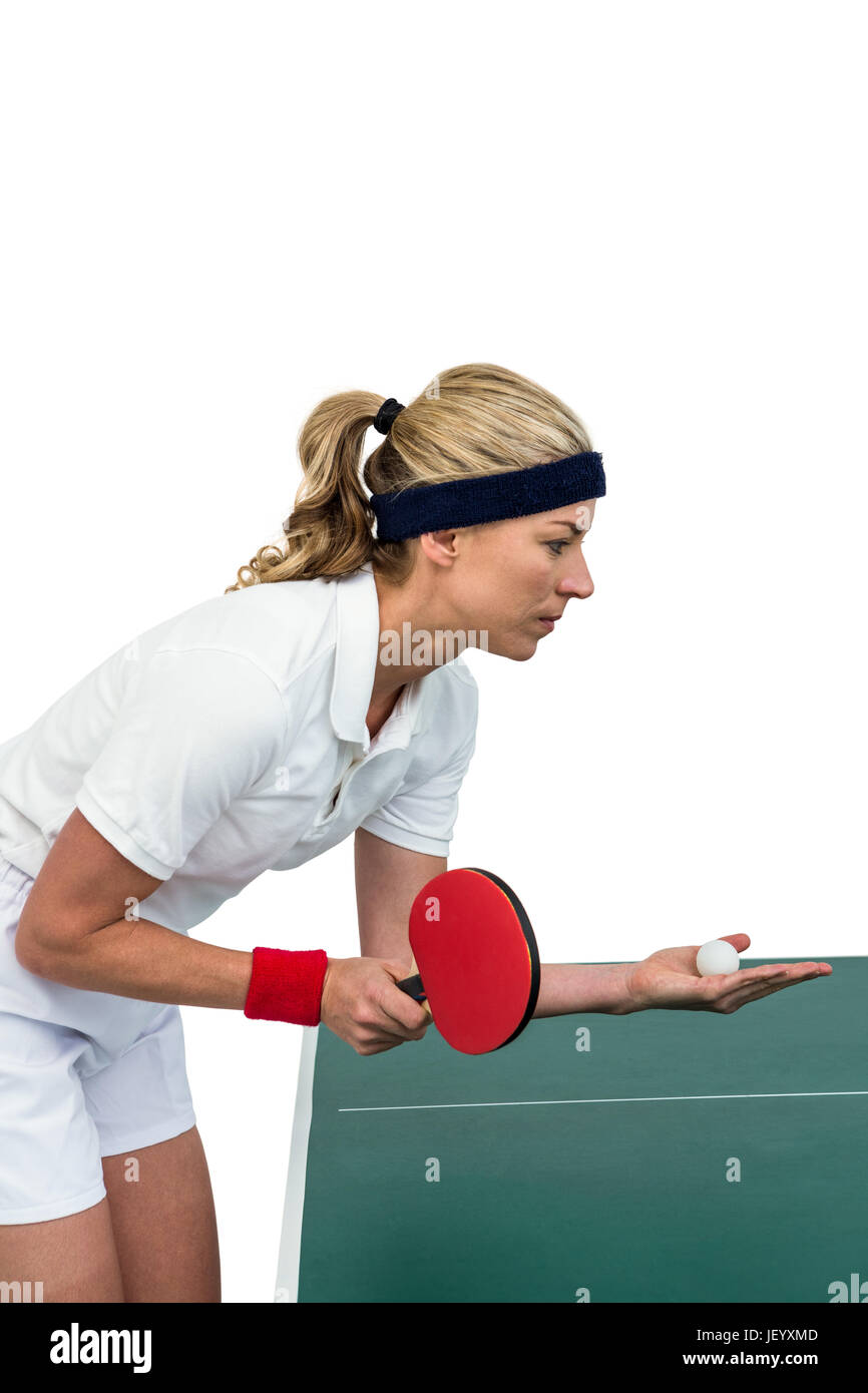 Atleta femminile giocando a ping-pong Foto Stock