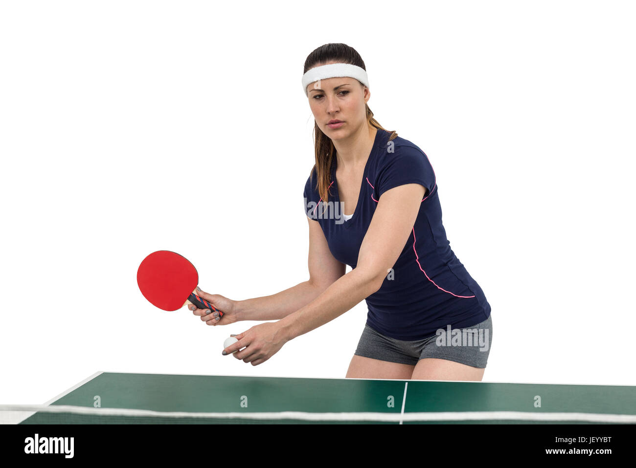 Atleta femminile giocando a ping-pong Foto Stock