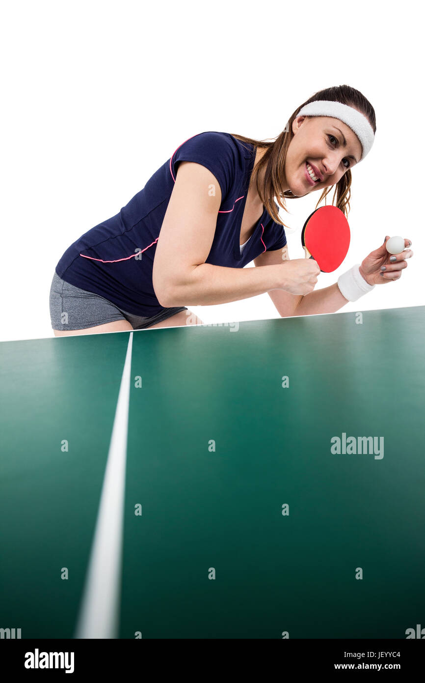 Atleta femminile giocando a ping-pong Foto Stock