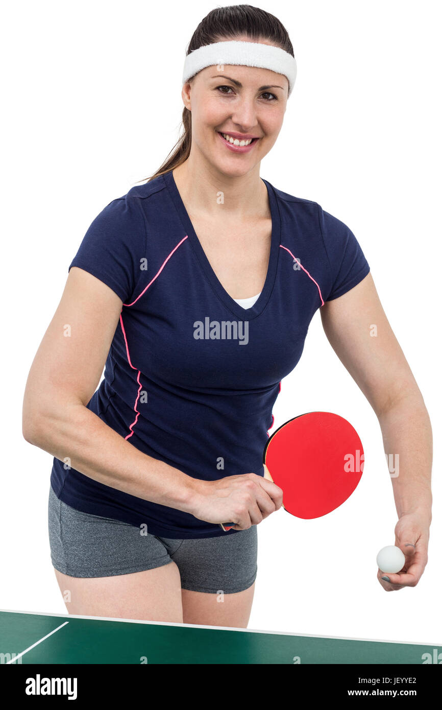 Atleta femminile giocando a ping-pong Foto Stock