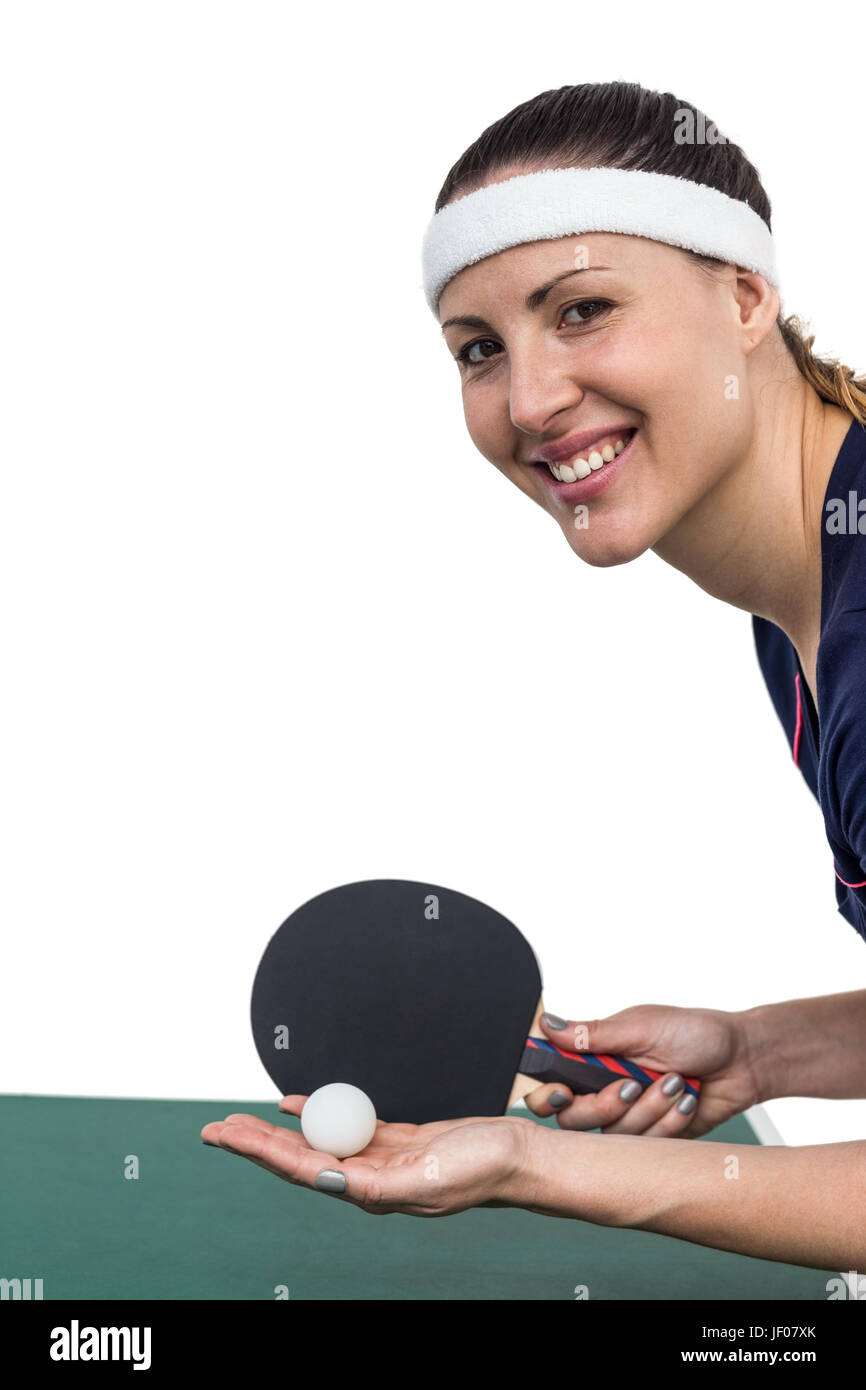 Atleta femminile giocando a ping-pong Foto Stock