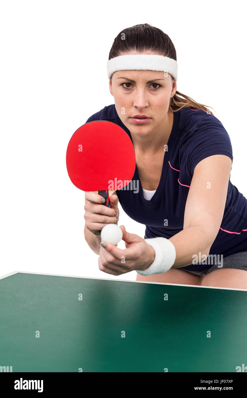 Atleta femminile giocando a ping-pong Foto Stock