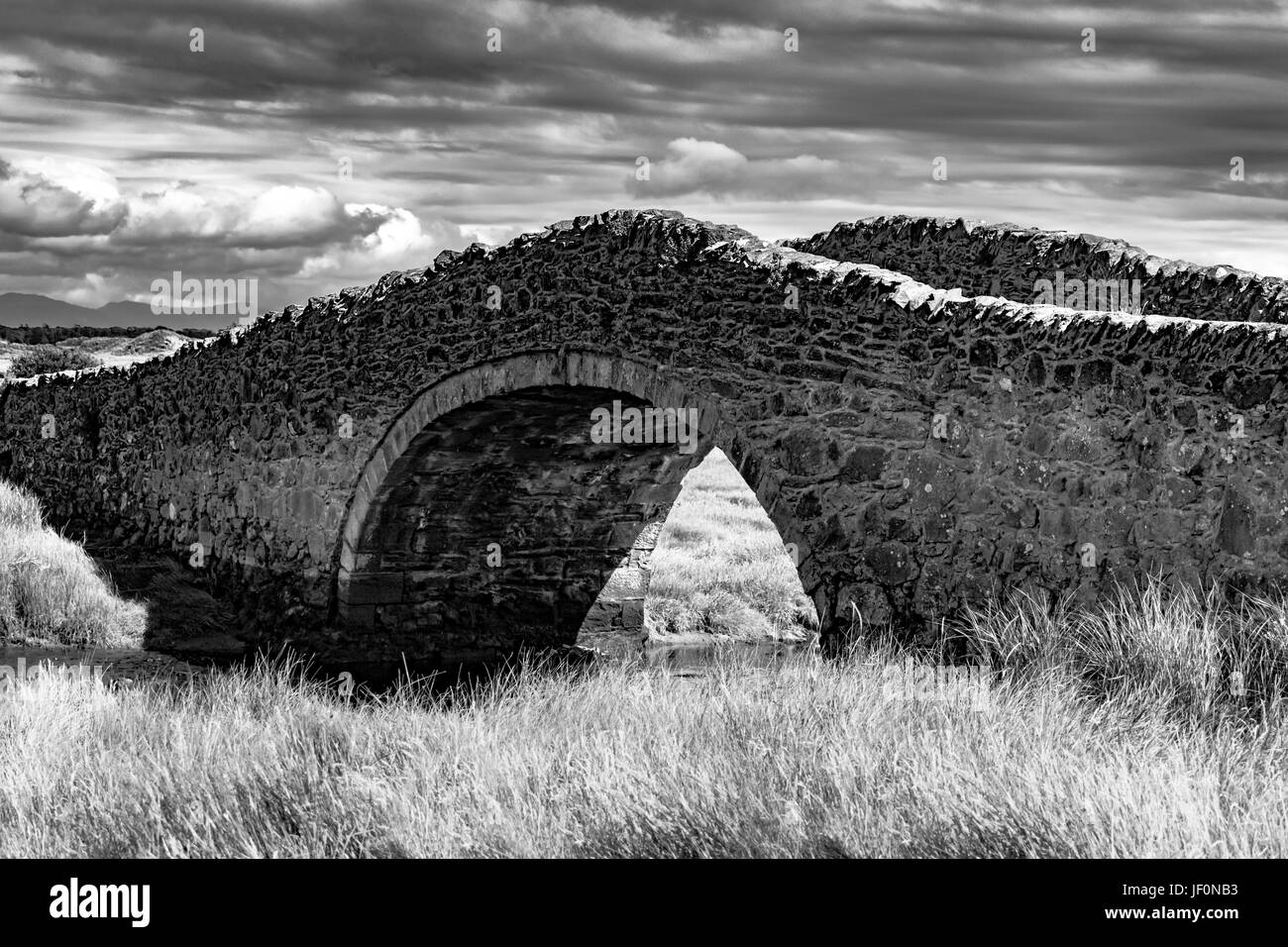 Aberffraw del XVIII secolo il ponte di pietra sul isola di Anglesey Foto Stock