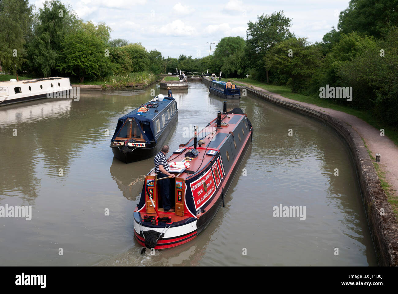 Narrowboats a Calcutt serrature, Grand Union Canal, Warwickshire, Inghilterra, Regno Unito Foto Stock