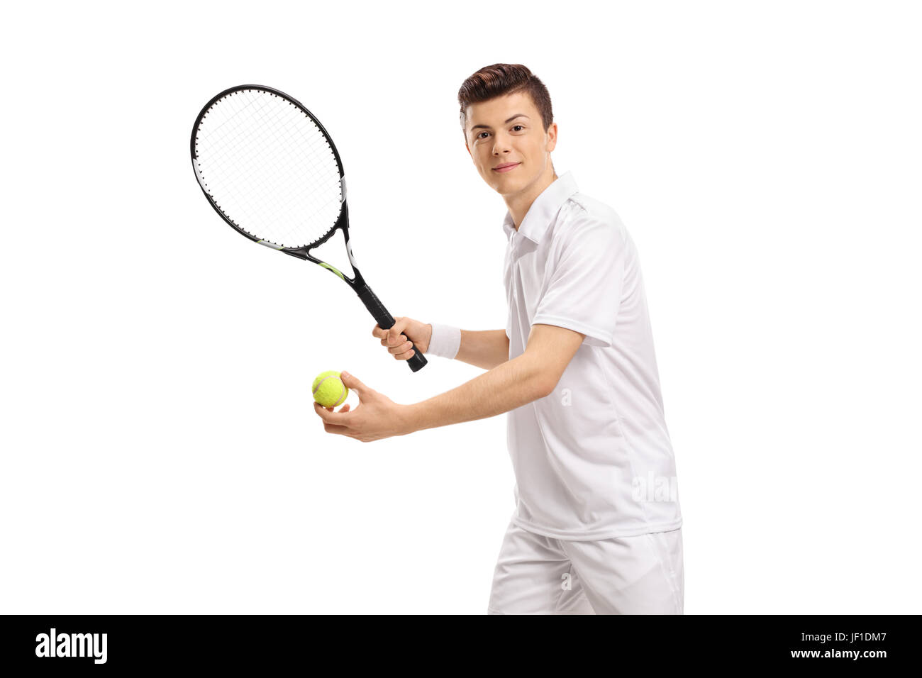Teenage giocatore di tennis preparando a servire isolati su sfondo bianco Foto Stock