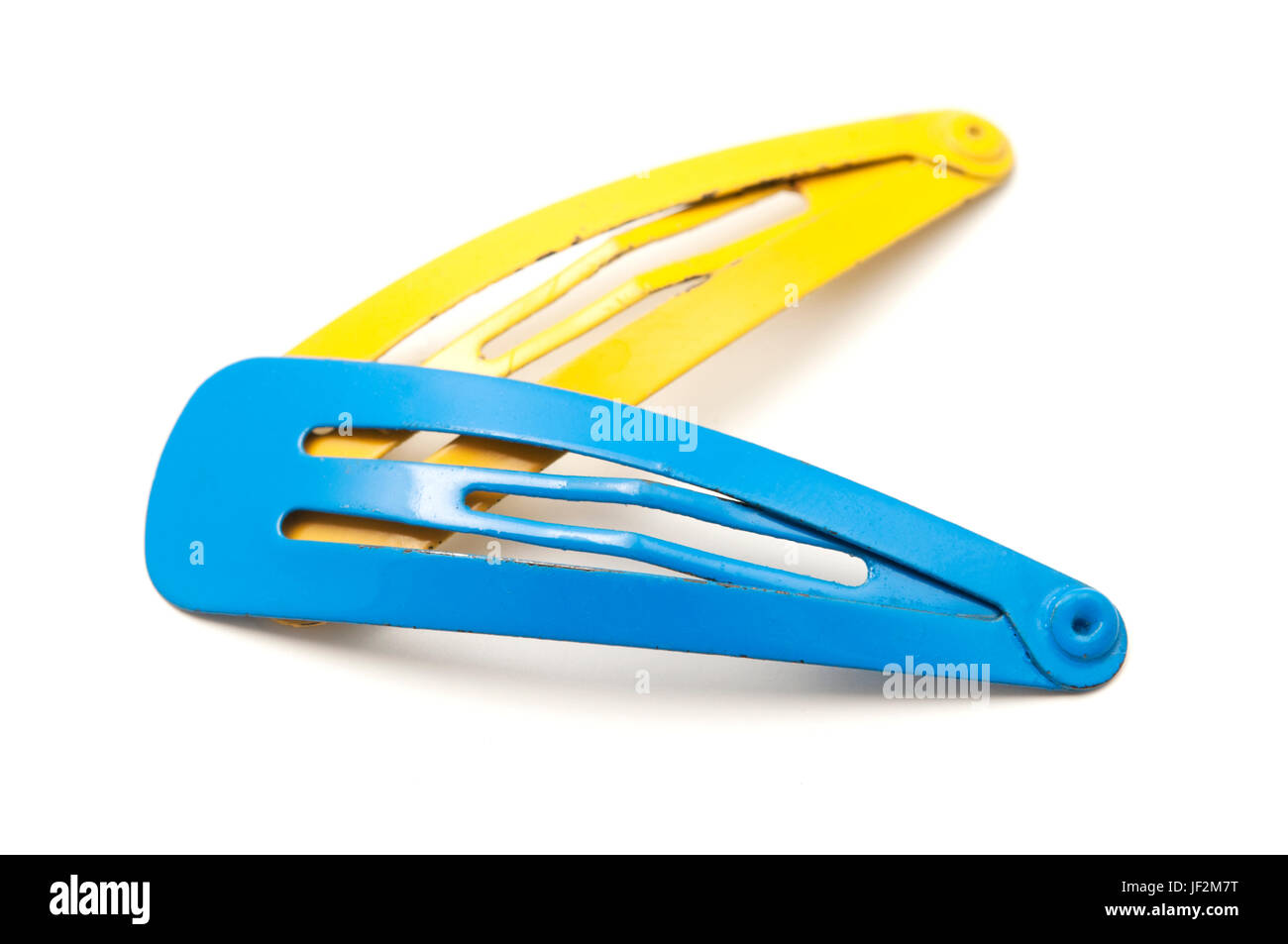 Blu e Giallo barrettes dei capelli su sfondo bianco Foto Stock