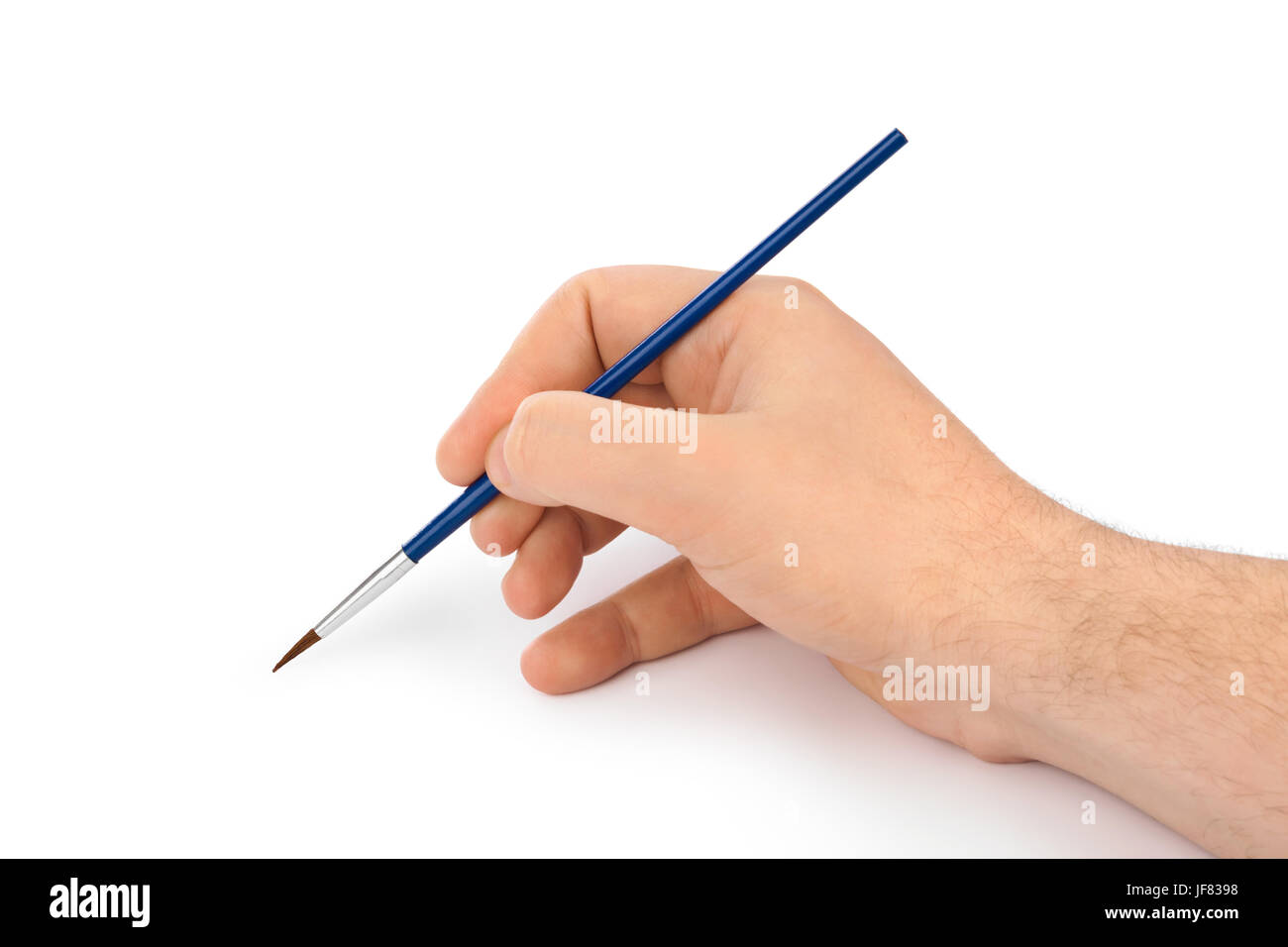Mano con pennello Foto Stock